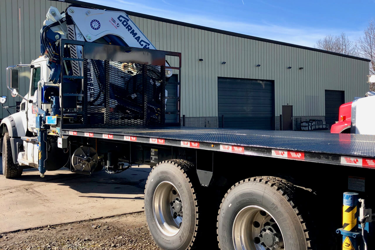 Bucket trucks, oil equipment, grapple trucks & boom trucks for rent